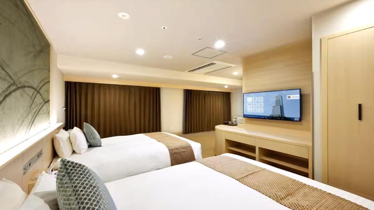 Odysis Suites Osaka Airport Hotel Izumisano Extérieur photo