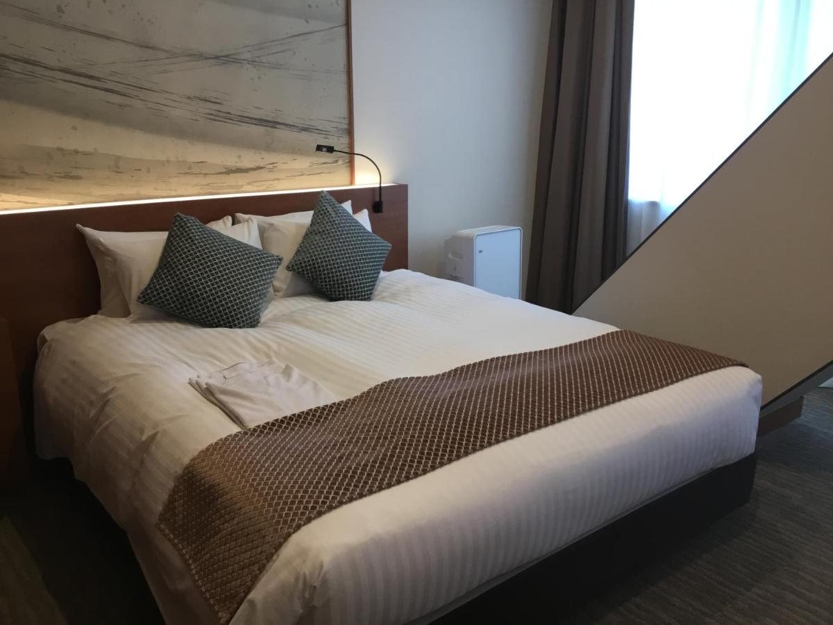 Odysis Suites Osaka Airport Hotel Izumisano Extérieur photo